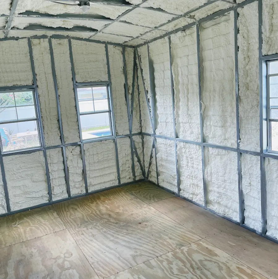 Closed-cell spray foam insulation applied to wall cavities in a residential project in Meriden
